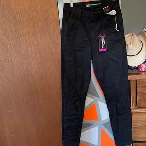 Super high rise distressed black jeggings